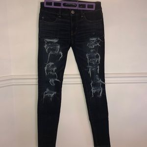 Dark blue American eagle ripped jeans (stretchy)